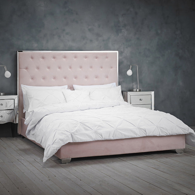 Linton 4FT6 Double Bed with Buttoned Chrome Metal Trim Headboard in Pink Velvet Fabric.