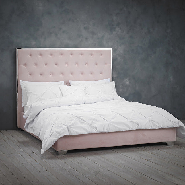 Linton 4FT6 Double Bed with Buttoned Chrome Metal Trim Headboard in Pink Velvet Fabric.